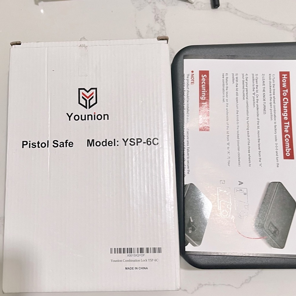 Pistol safe with combination lock